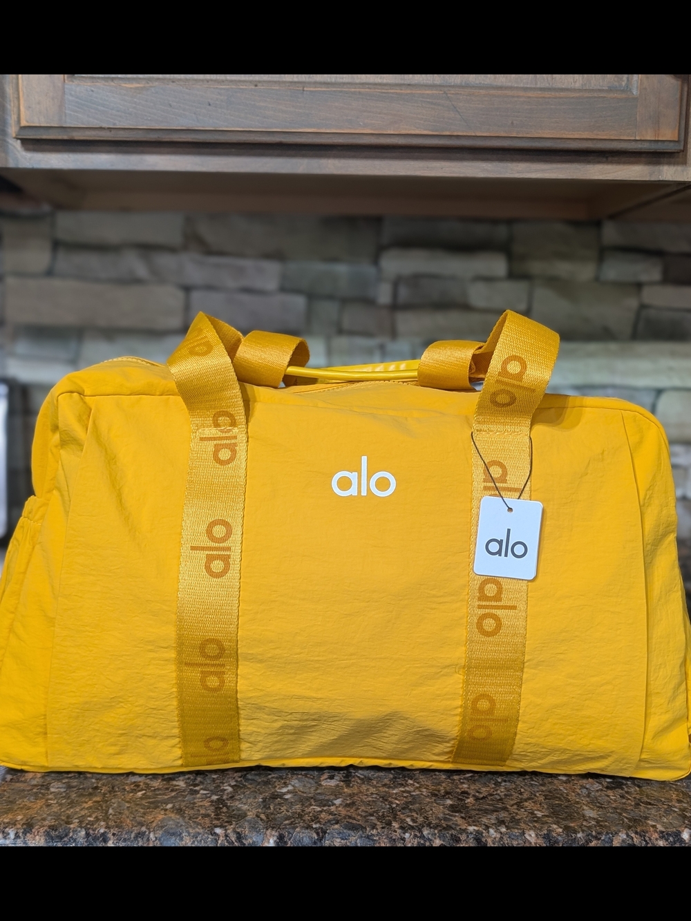 ALO Yoga Yellow Duffel Bag with Logo Strap